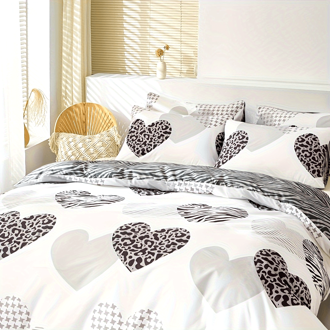 gros plan motif coeur léopard et zèbre pour housse de couette